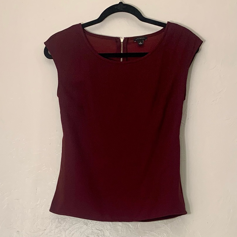 Small sleeveless burgundy blouse
